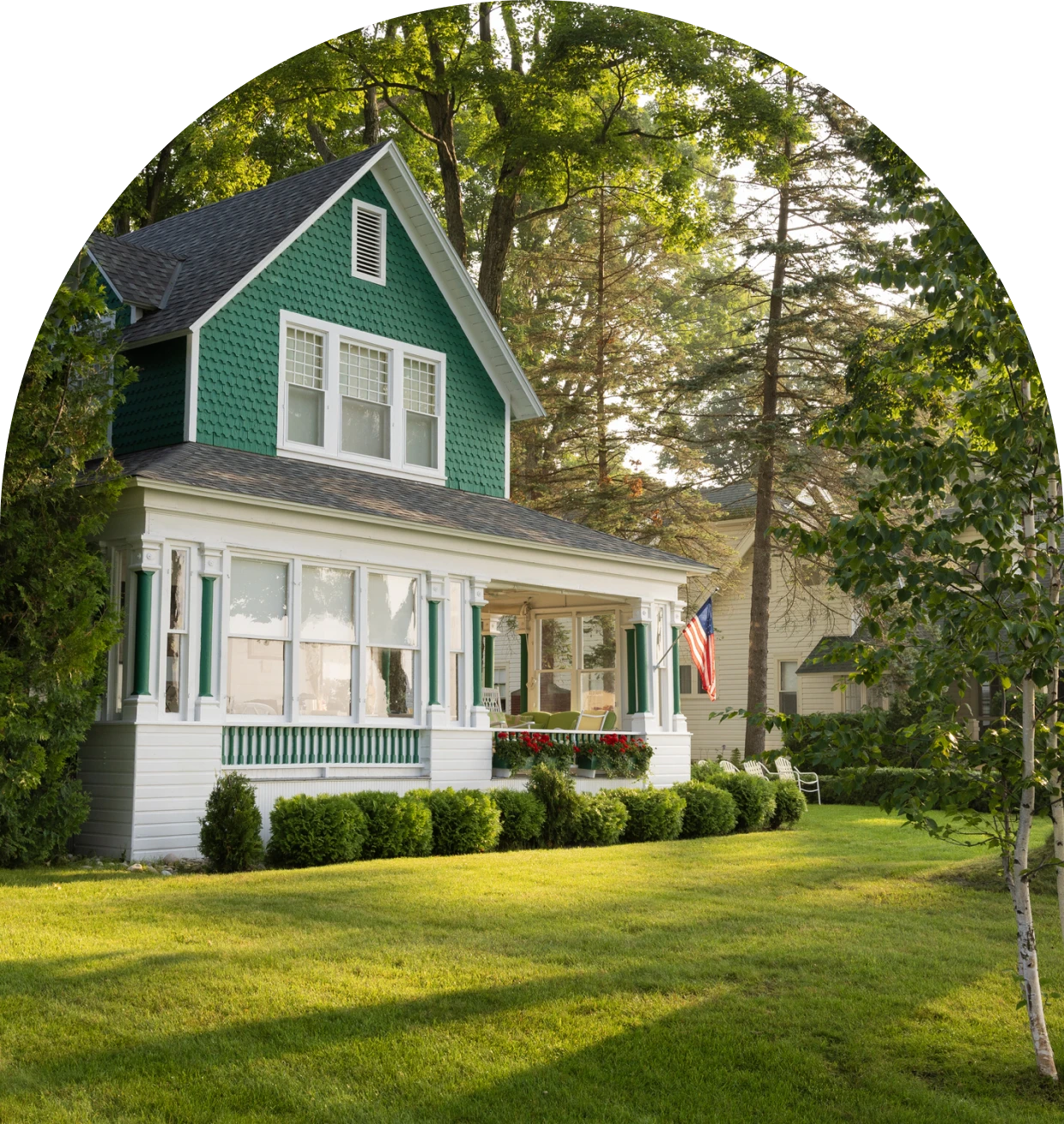 Victorian-style home in lush setting